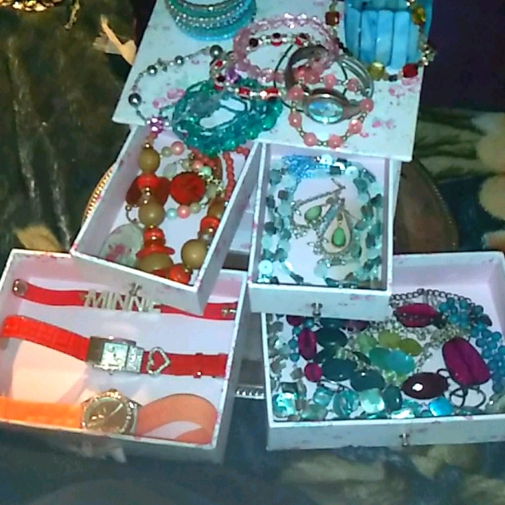My grandmas red/blue jewelry in a jewelry box $17